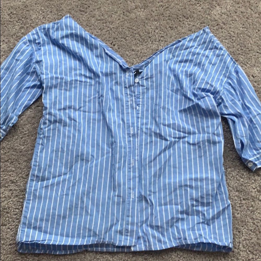 Quarter length sleeve off the shoulder shirt